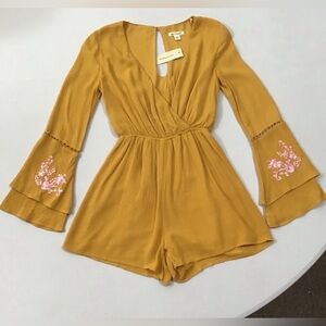 Francesca’s Shorts romper with Bell Sleeves